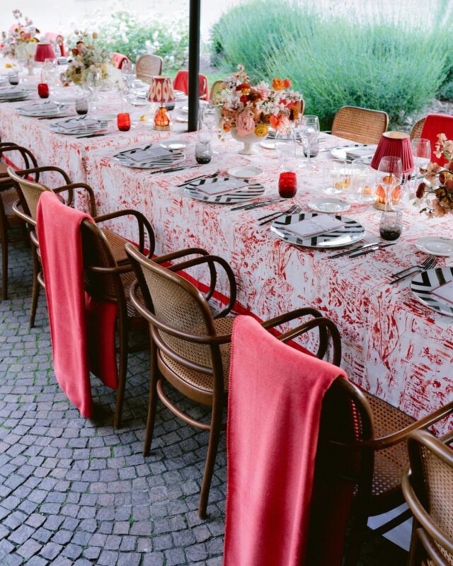 An intimate rehearsal dinner unfolded at Harry’s Bar in Cernobbio, exclusively for family members. The main color palette was inspired by the restaurant’s interior, which included red, black, and white. Collaborating with Jo Shipp, we designed a custom Como print for the tablecloth, accented with red borders. Geometric-patterned plates and modern lamps with a red velvet edge were carefully chosen to complement the tablecloth, resulting in a warm and elegant dining space.

Planning & Design: @lakecomoweddings
Photography: @josevilla 
Location: @harrysbarcernobbio 
Florals: @tulipinadesign 
Entertainment: @elanartists 
Printed Goods: @inquisited 
Videographer: @aaronnovakfilms 
Custom Tablecloth: @jes.artist_designer 

#TheLakeComoWeddingPlanner #LakeComo #LagodiComo #Wedding #DestinationWedding #Weddings #WeddingIdeas #WeddingDecor