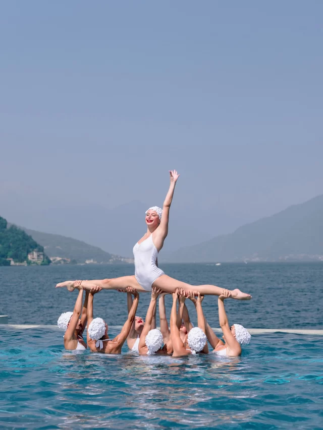 Moments Of Mary Ellen & Travis Wedding.

A sunlit beach day by the pool, where the celebration took on a playful rhythm. Synchronized swimmers moved through the water in an unexpected, elegant performance, setting the tone for a day of lightness, joy, and effortless beauty.
